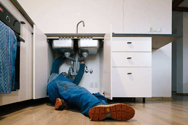 Professional Emergency Plumber technician working in Lamoni, IA